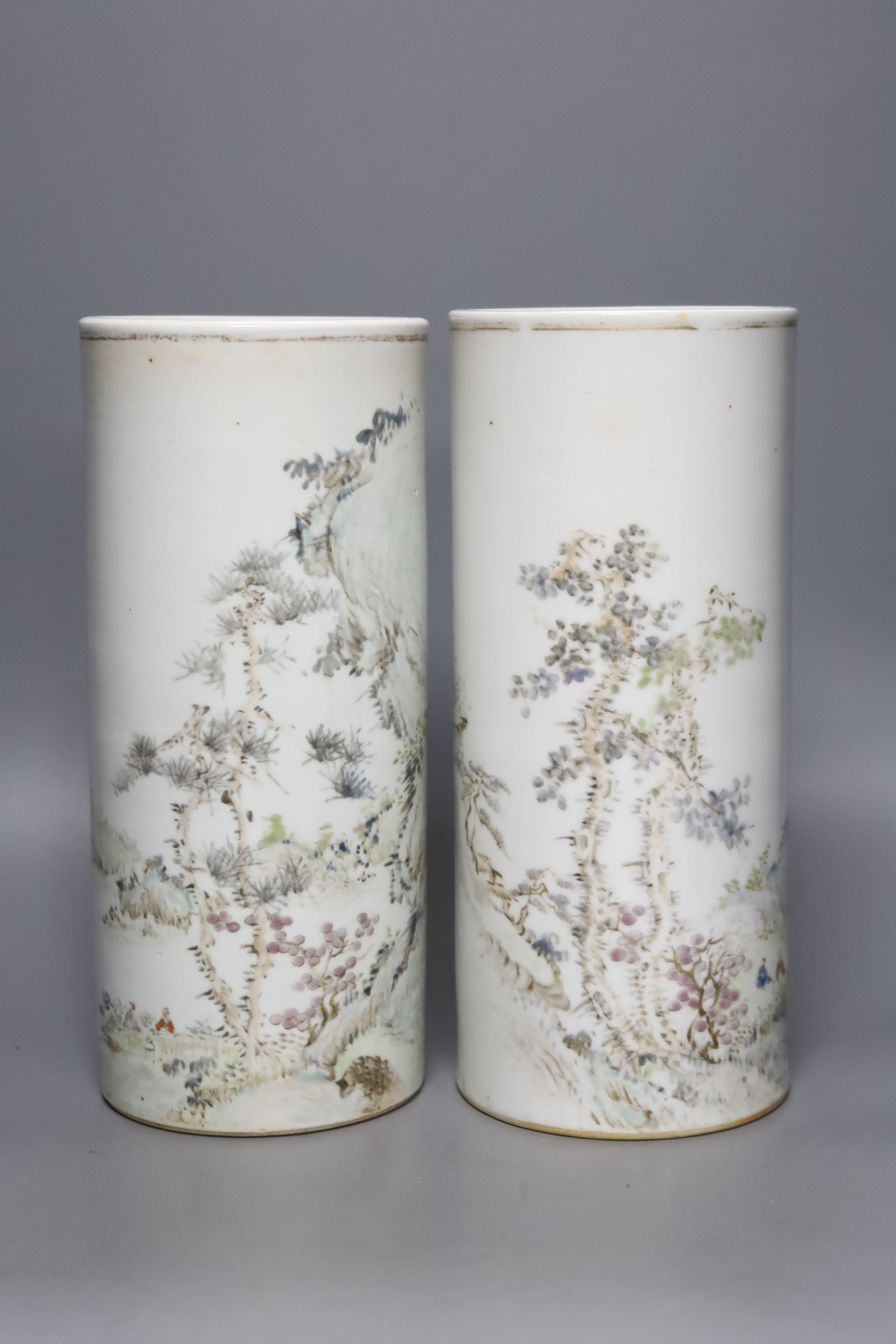 A pair of Chinese cylindrical porcelain vases, height 28cm